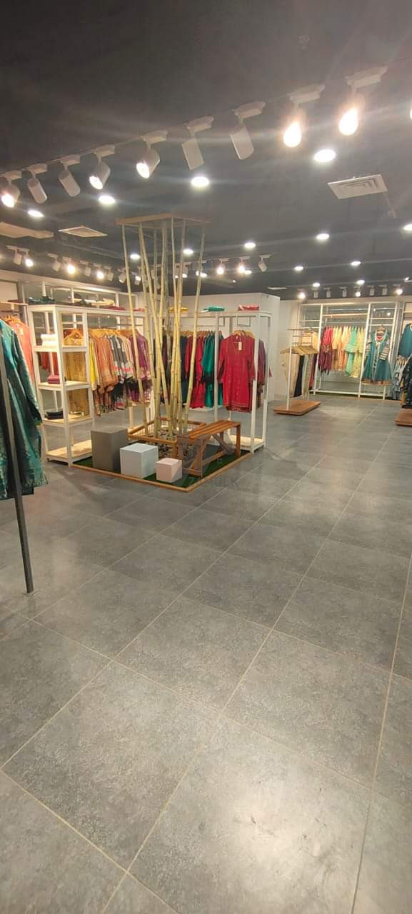 Rented corner shop on sale on installment at Mezzanine floor (above ground) Grand Atrium Faisalabad